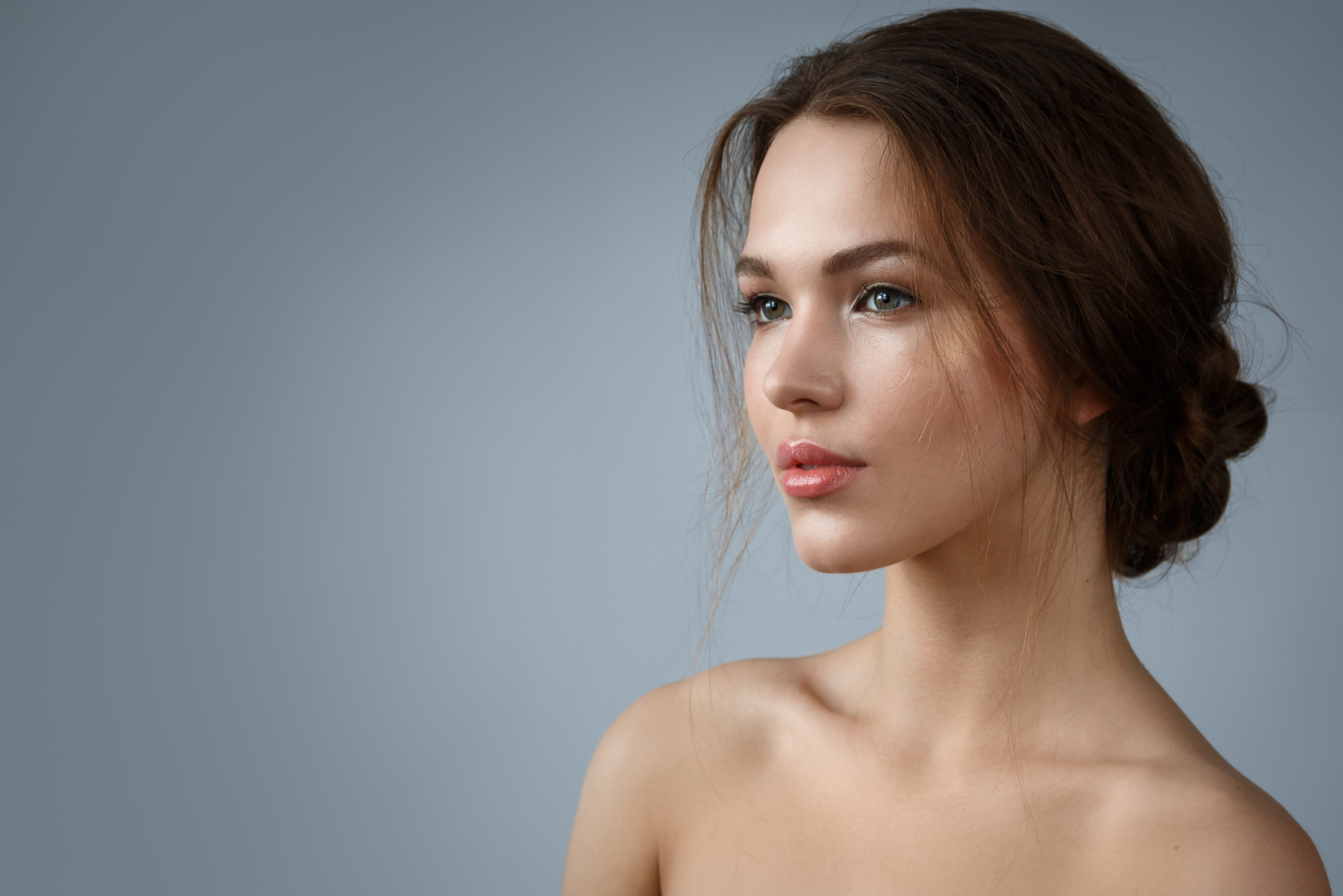 Portrait of beautiful woman with natural make up and hairstyle.